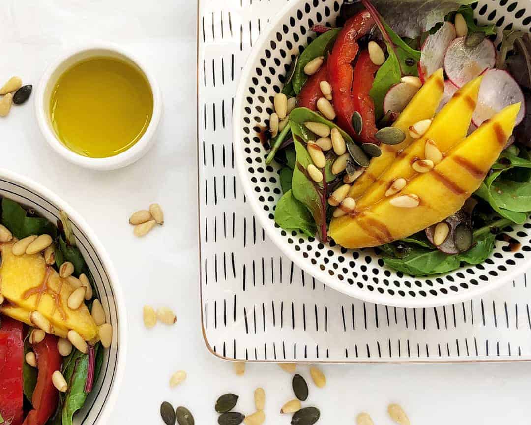 Green mango, pine nuts and homemade dressing salad