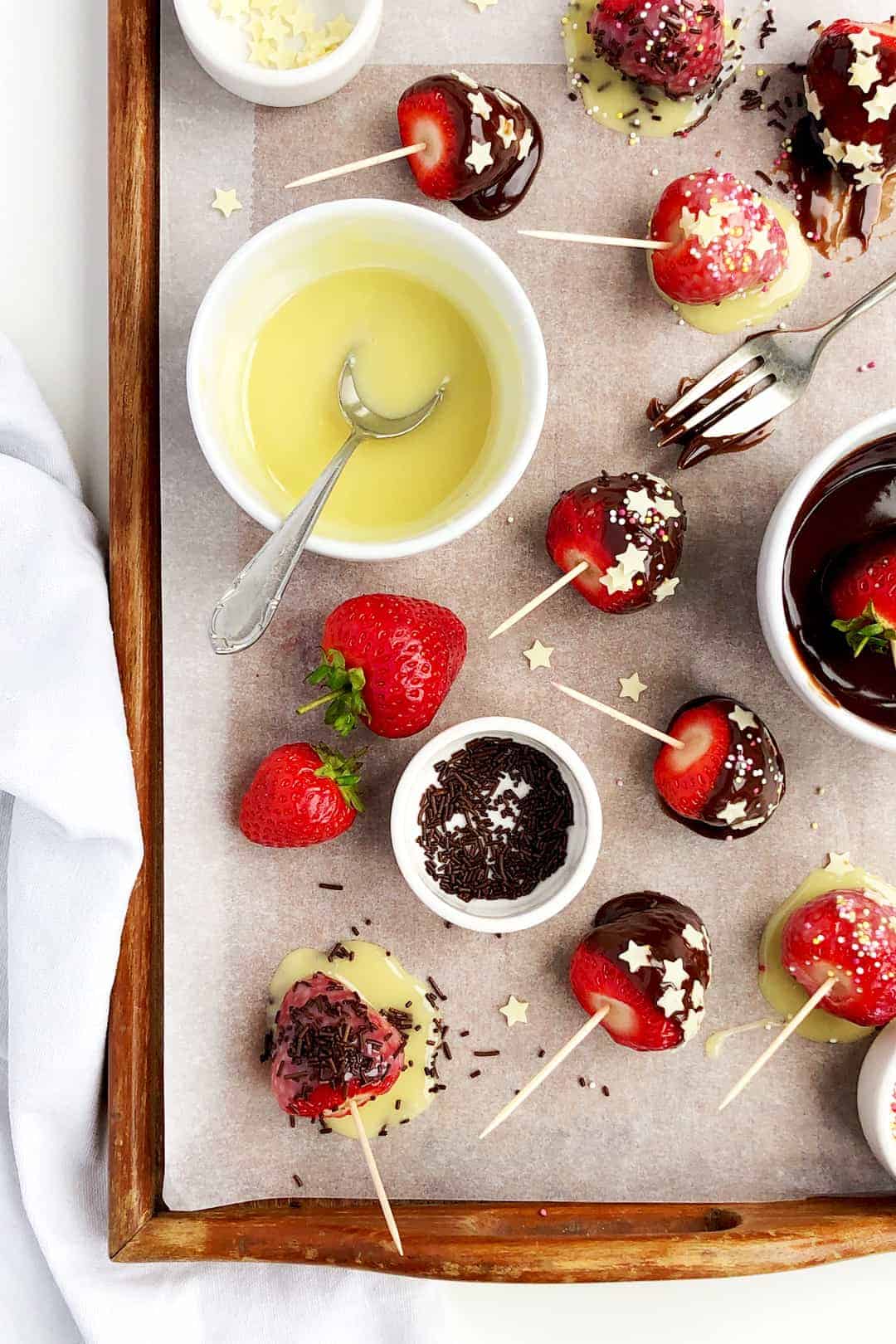 Summer dessert - fresh strawberries dipped in milk chocolate