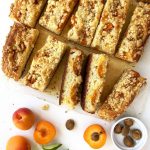 Yeast dough cake with fruit and coconut crumble