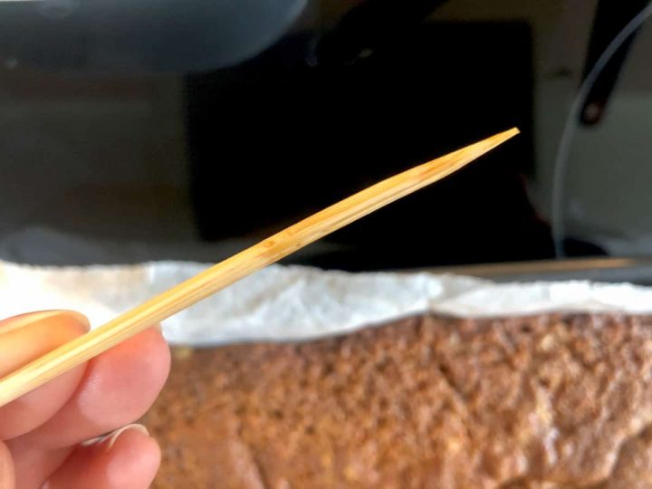 testing the cake with a skewer