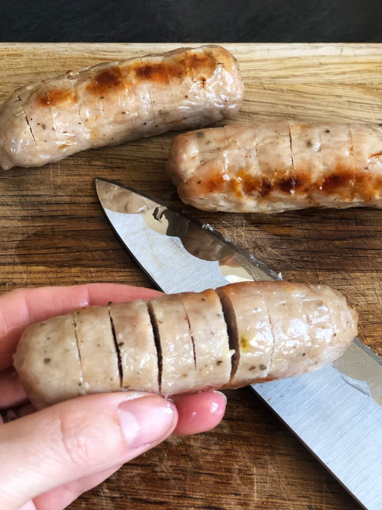 sausages with a small vertical cuts